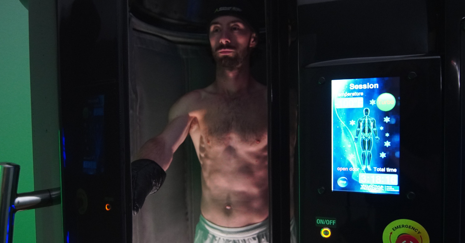 man exiting cryotherapy chamber